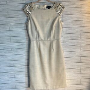 Elegant Cream Dress with Embellished Shoulders